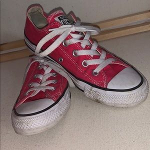 Pink colored converse.